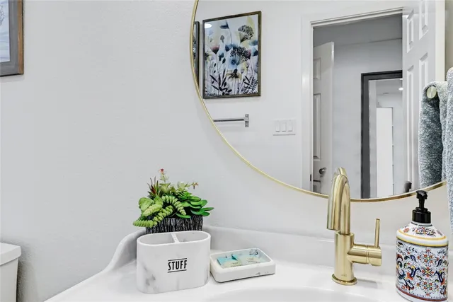 a view of a storage and utility room with washer and dryer