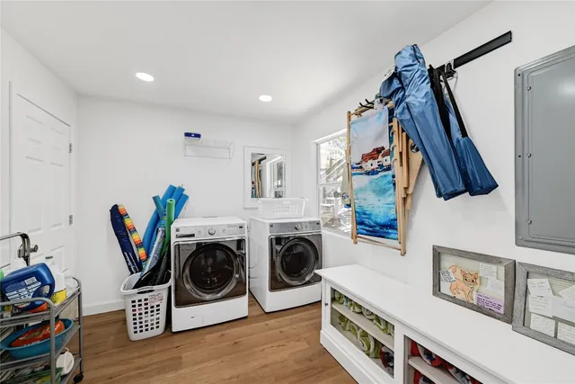 a book shelf with books and knick knacks on it