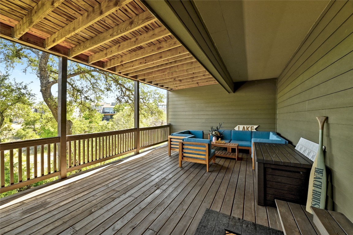 225 Comanche Lane Point Venture, TX 78645 - Photo 38 of 40 a view of a wooden chairs on deck