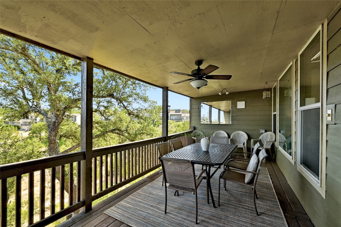 225 Comanche Lane Point Venture, TX 78645 - Photo 40 of 40 a view of a porch with furniture and a yard