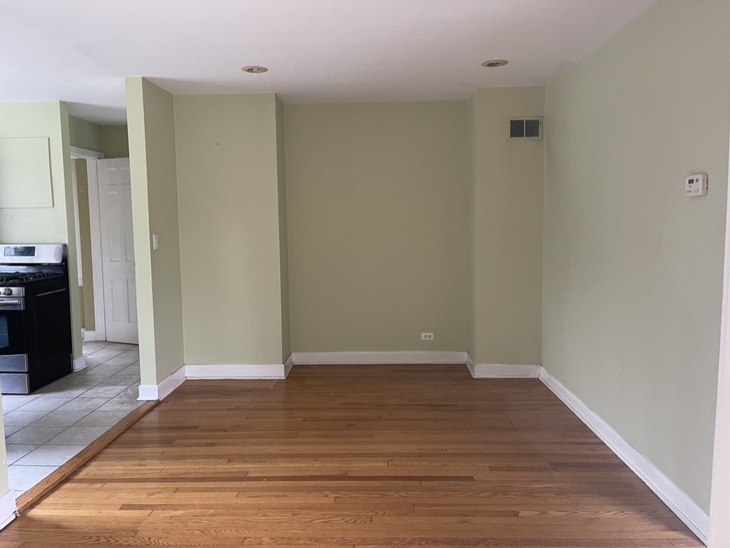 791 Braeburn Road Inverness, IL 60067 - Photo 6 of 14 a view of an empty room with wooden floor