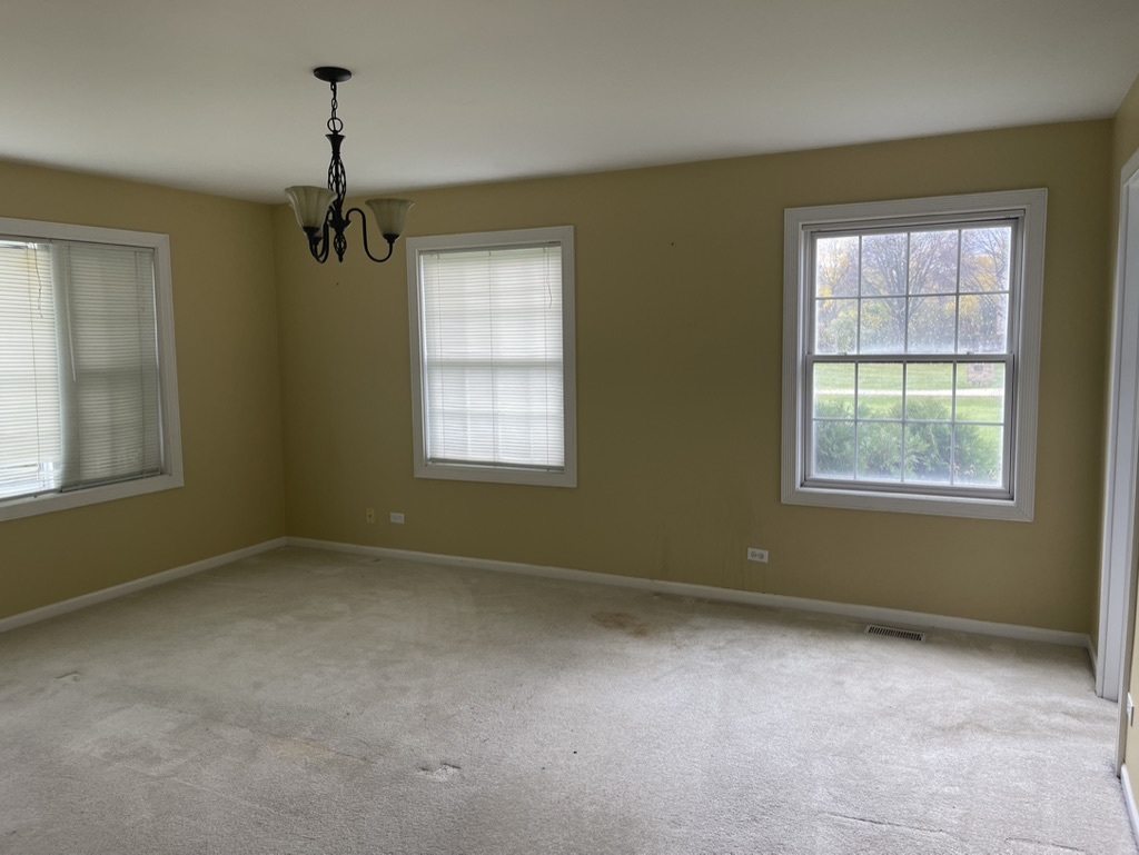 791 Braeburn Road Inverness, IL 60067 - Photo 9 of 14 an empty room with windows