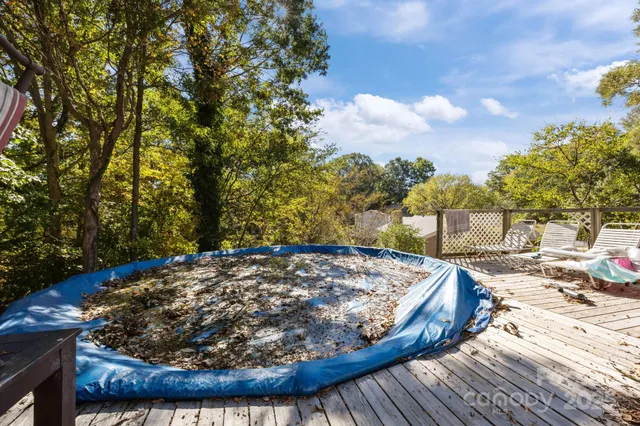 a view of a wooden floor with a yard