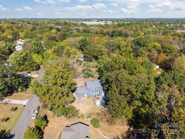 an aerial view of residential house with outdoor space