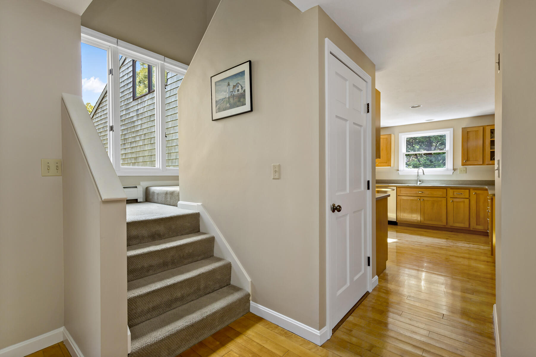 21 Eldridge Street Buzzards Bay, MA 02532 - Photo 15 of 40 a view of an entryway with wooden floor and a bedroom