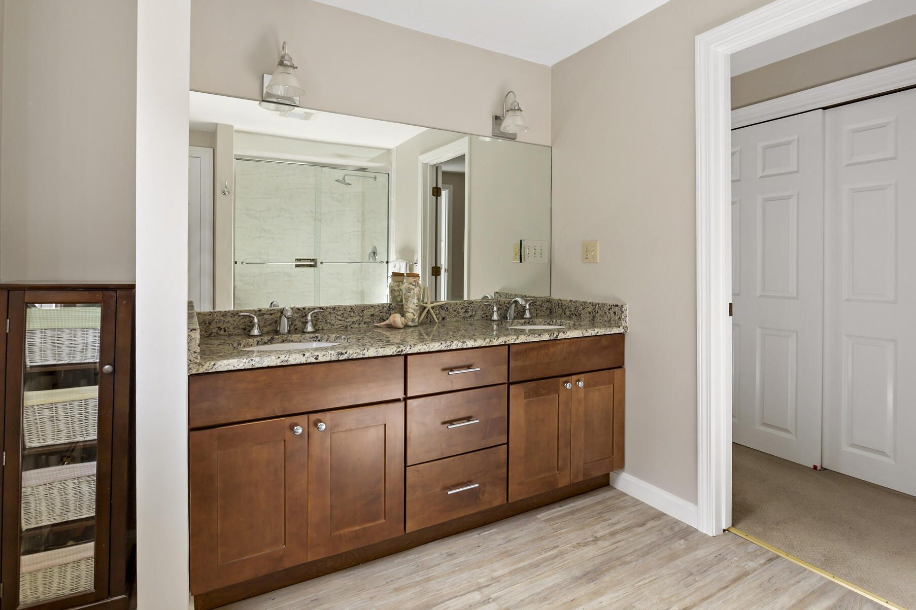 21 Eldridge Street Buzzards Bay, MA 02532 - Photo 22 of 40 a bathroom with a granite countertop sink and a mirror