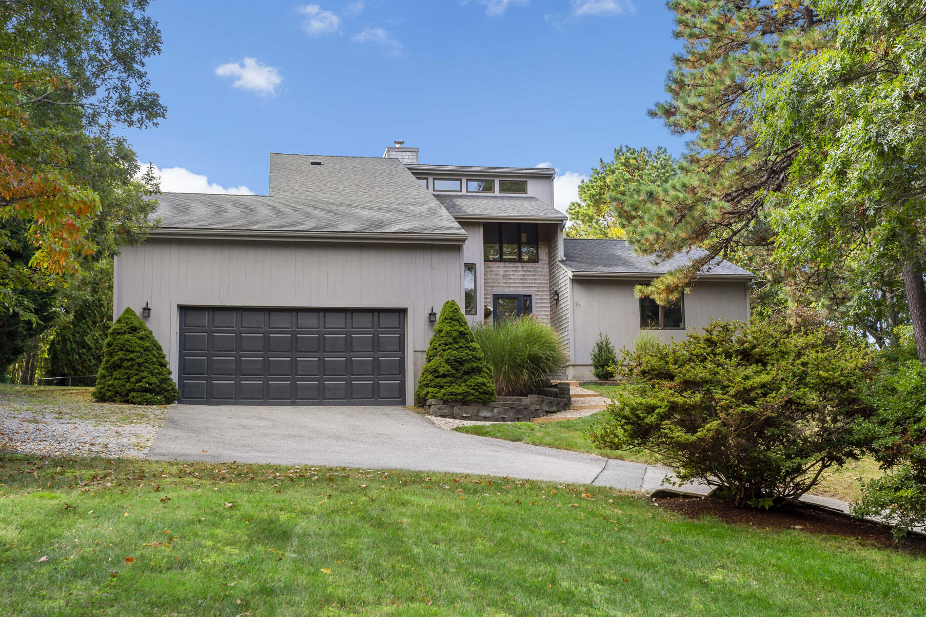 21 Eldridge Street Buzzards Bay, MA 02532 - Photo 34 of 40 a view of a house with a garden and yard
