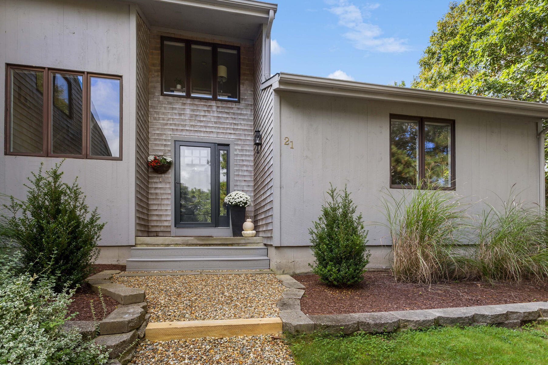 21 Eldridge Street Buzzards Bay, MA 02532 - Photo 35 of 40 a front view of a house with garden