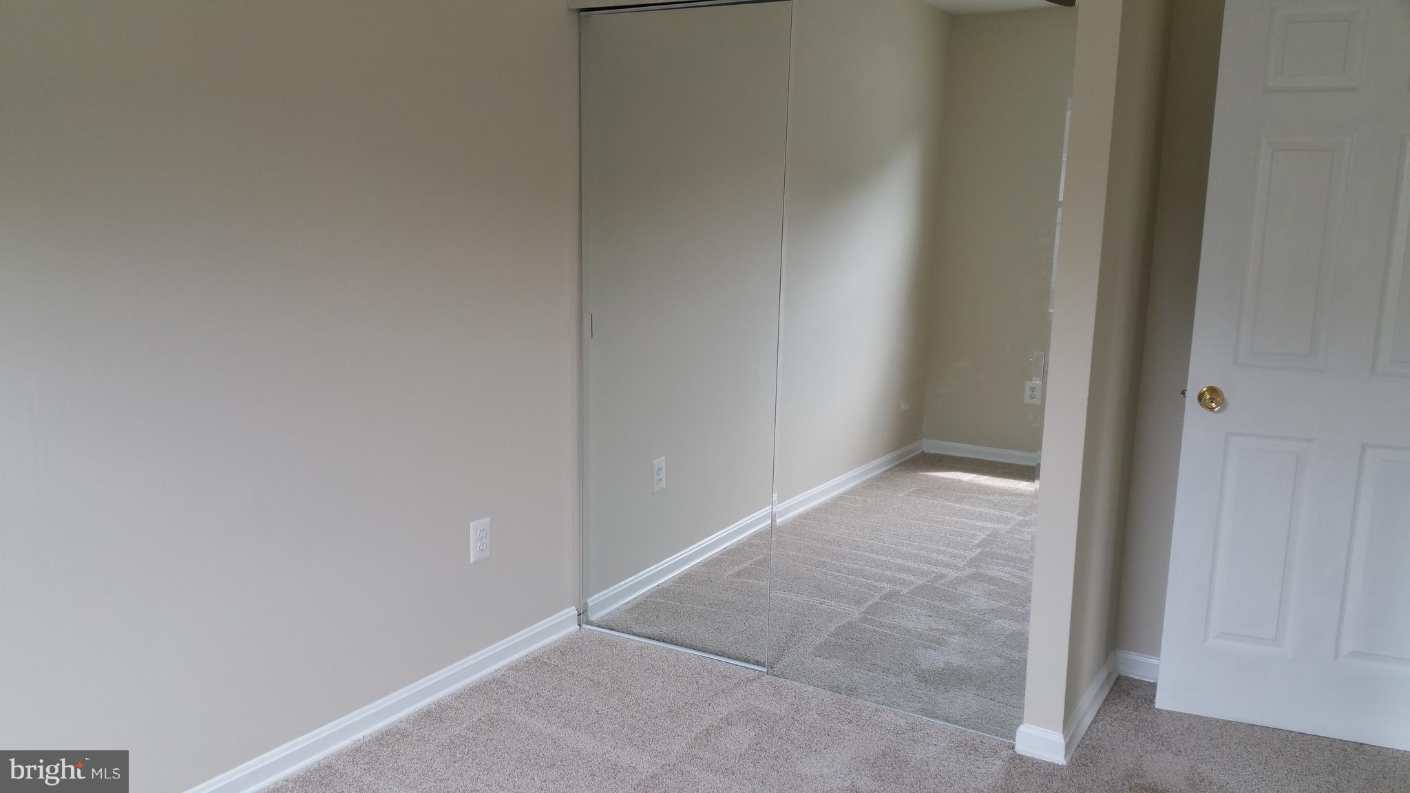 7610 Stuart Court Manassas, VA 20111 - Photo 12 of 16 3rd Bedroom with Mirrored Closets