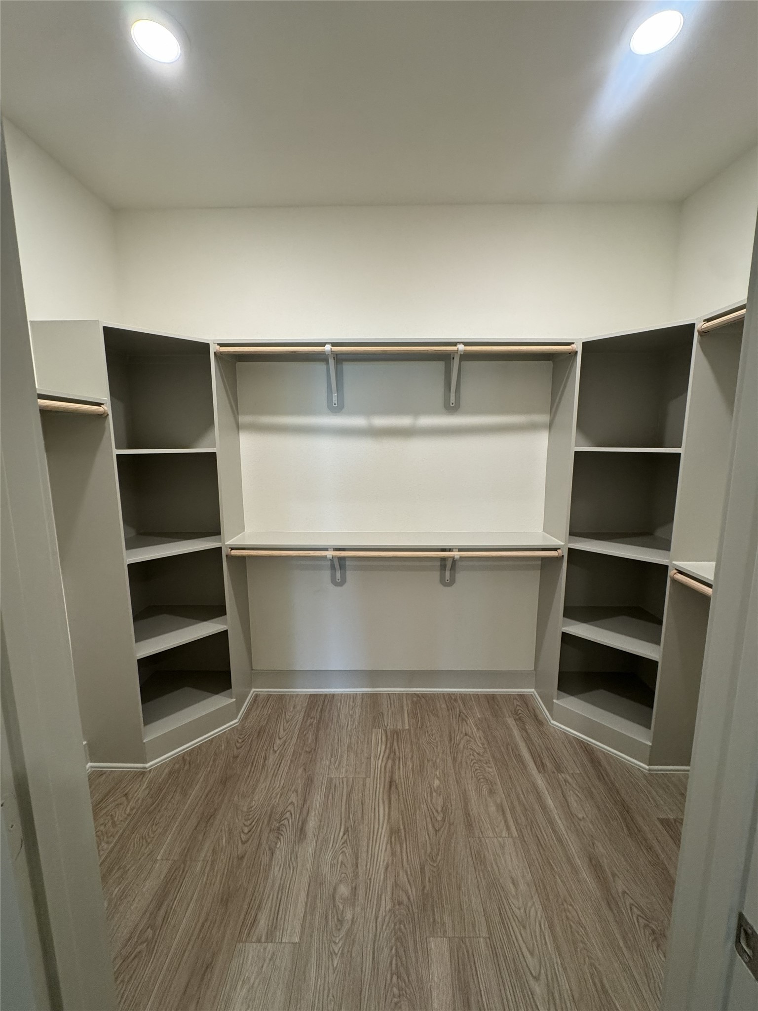 26244 Twin Oaks Road Splendora, TX 77372 - Photo 5 of 10 a view of walk in closet with empty racks