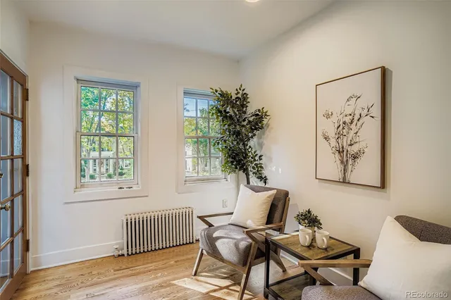 a view of kitchen with refrigerator and window