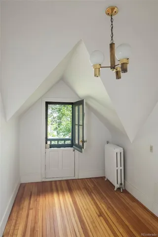 a view of a patio with table and chairs garden and plants