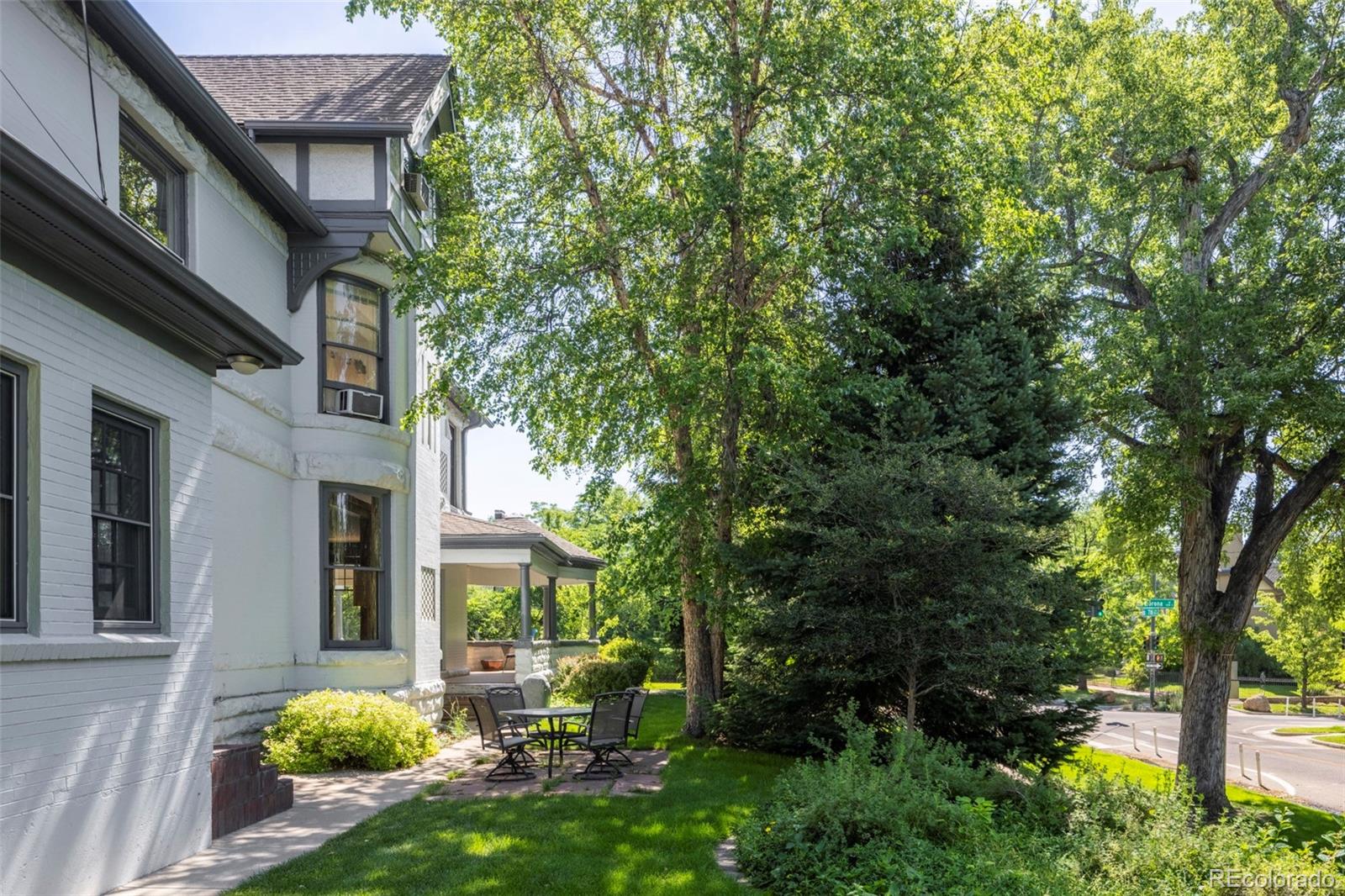 707 Corona Street Denver, CO 80218 - Photo 42 of 46 a view of a house with balcony and garden