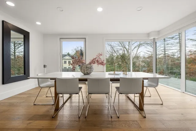 a view of a dining room with furniture window and outside view