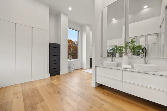 a view of kitchen with sink and natural light