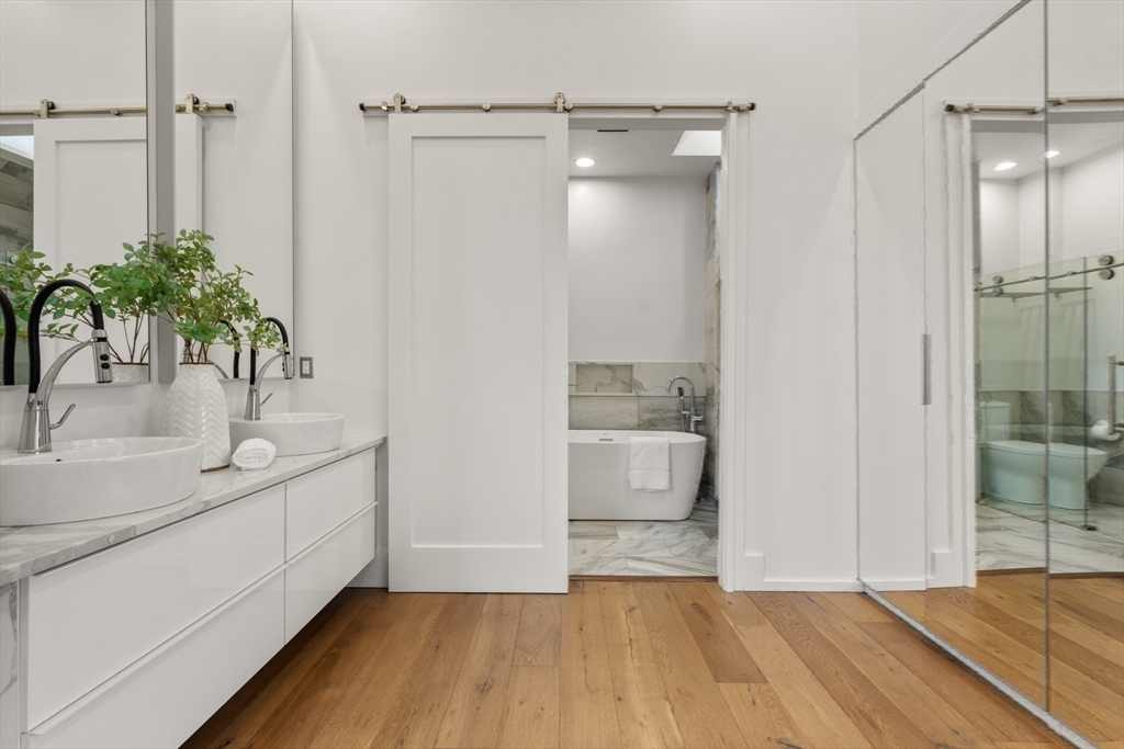 30 Whipple Road Lexington, MA 02420 - Photo 23 of 32 a bathroom with a sink and shower