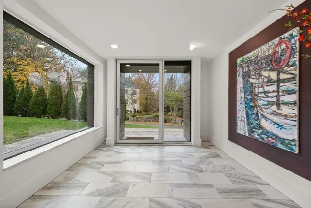 a view of an entryway with a garden