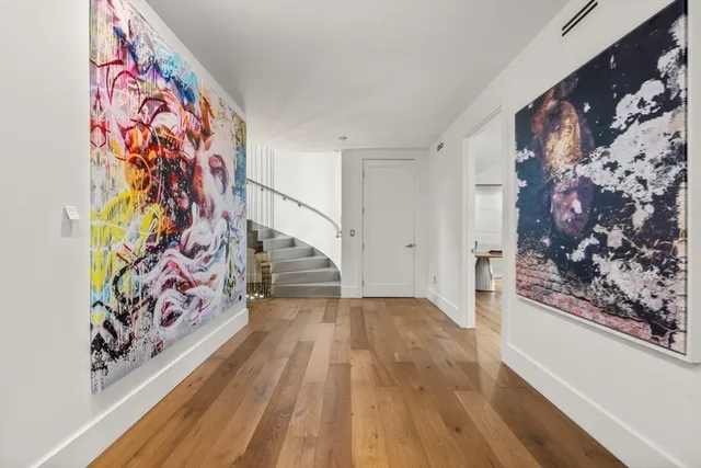 a view of a entryway with wooden floor