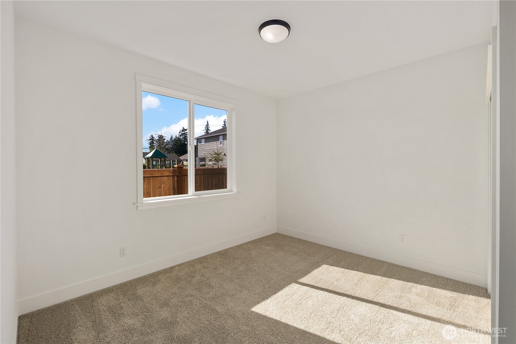 729 211th Place Southeast Bothell, WA 98021 - Photo 11 of 26 an empty room with a window