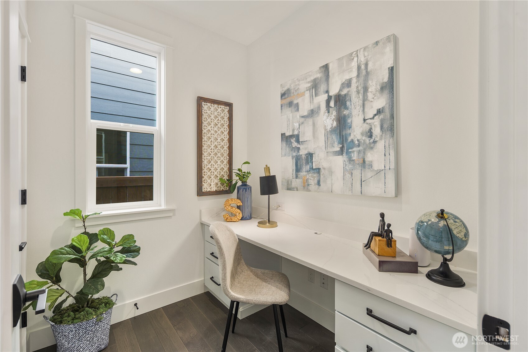 729 211th Place Southeast Bothell, WA 98021 - Photo 12 of 26 a bathroom with a sink a mirror and a potted plant
