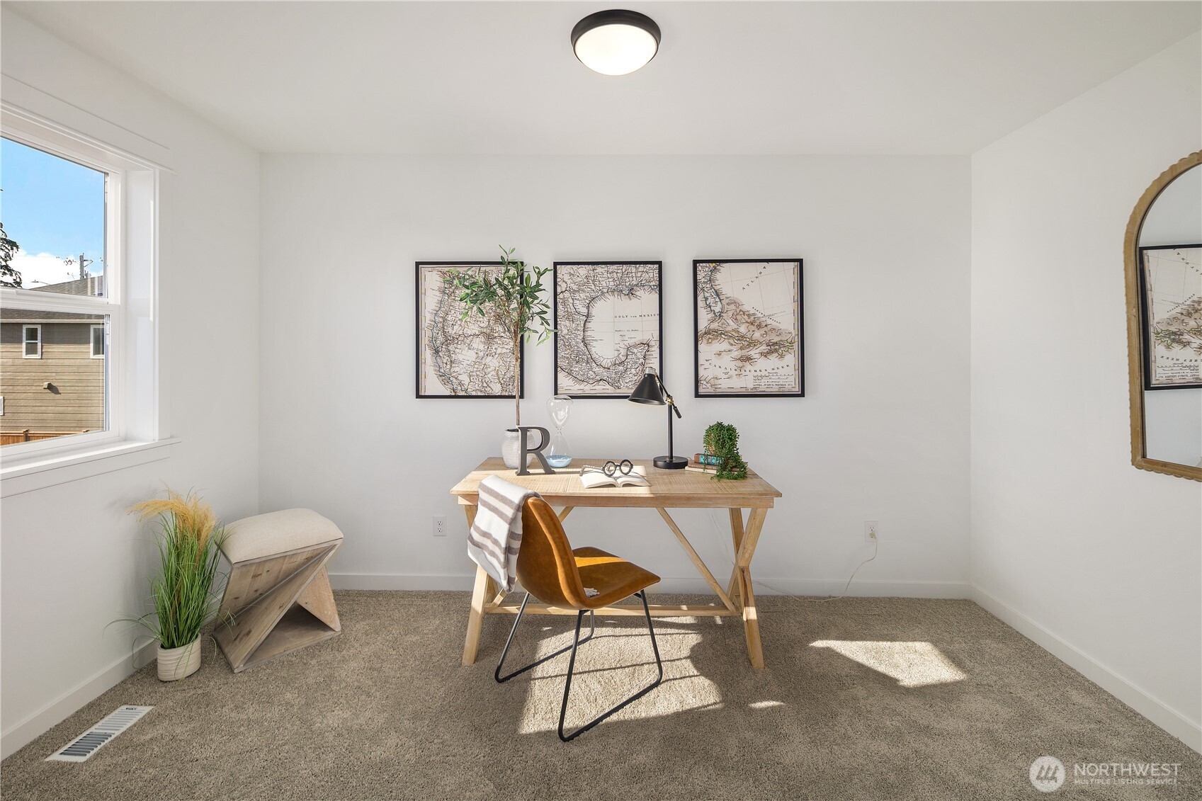 729 211th Place Southeast Bothell, WA 98021 - Photo 15 of 26 a view of a workspace with furniture and a window