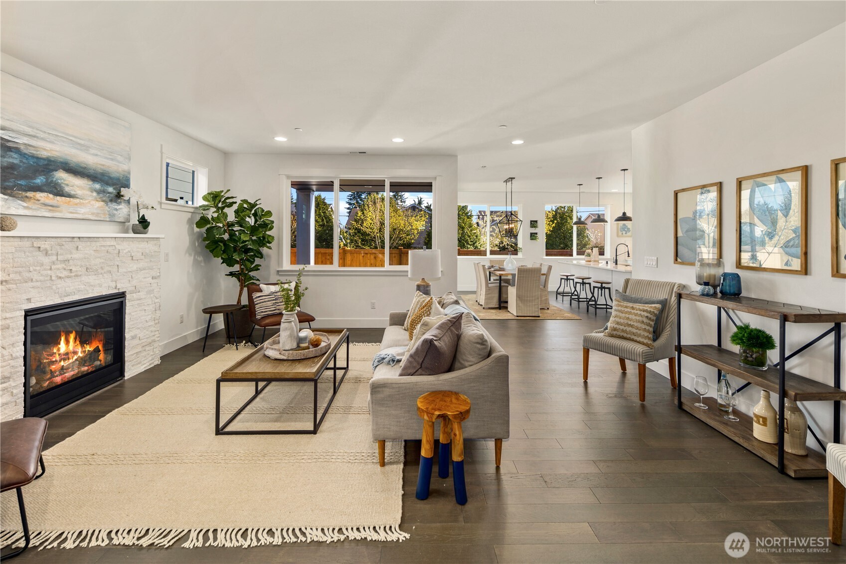 729 211th Place Southeast Bothell, WA 98021 - Photo 6 of 26 a living room with furniture large window and a fireplace