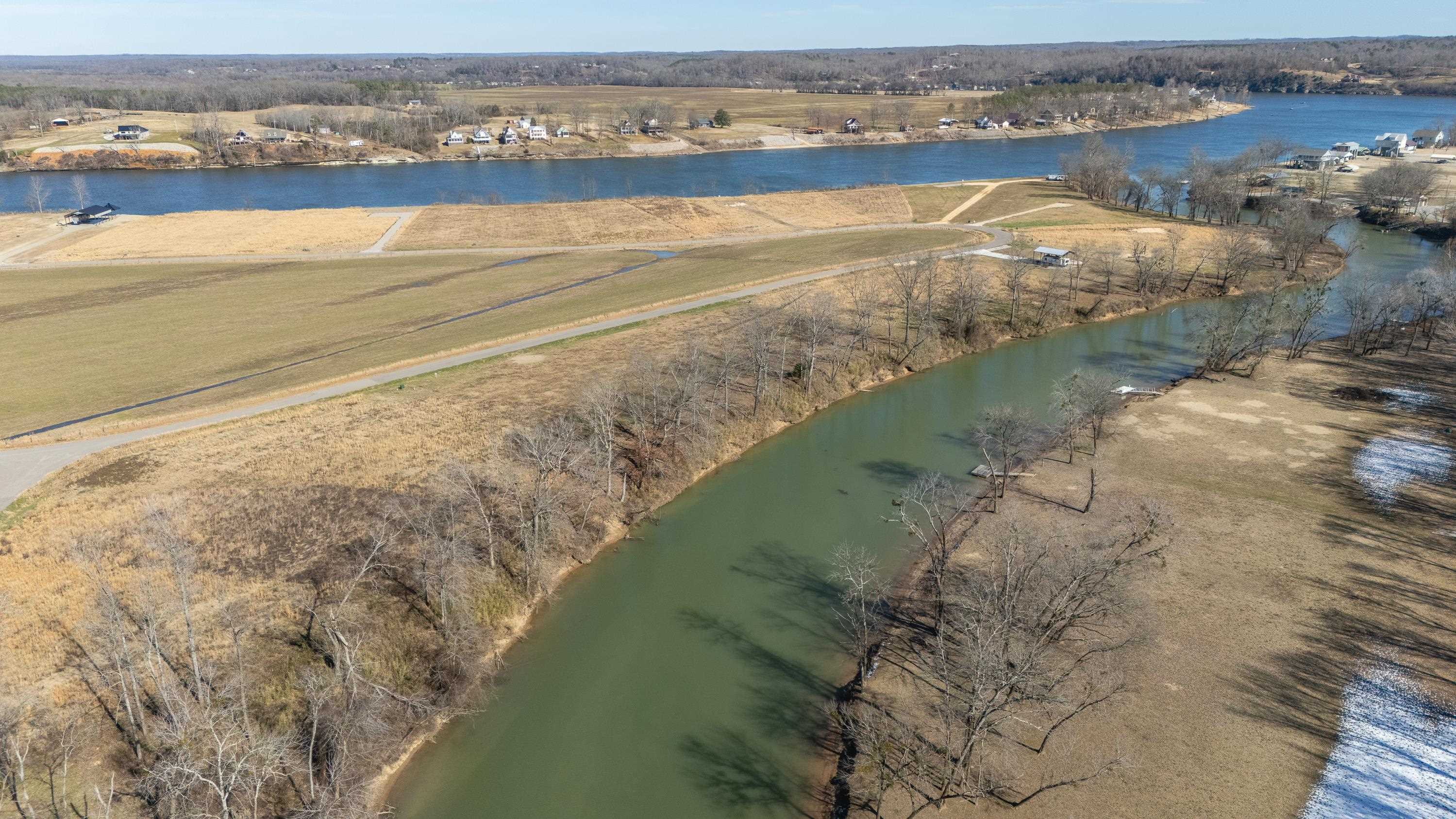 Lot 112 Cravens Road Savannah, TN 38372 - Photo 14 of 16 a view of a lake with a mountain