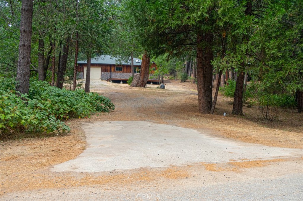 7115 Hites Cove Road Mariposa, CA 95338 - Photo 2 of 48 front view of a house with a street