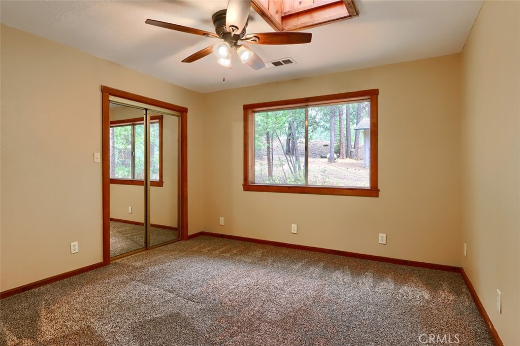 7115 Hites Cove Road Mariposa, CA 95338 - Photo 23 of 48 a view of an empty room with a window