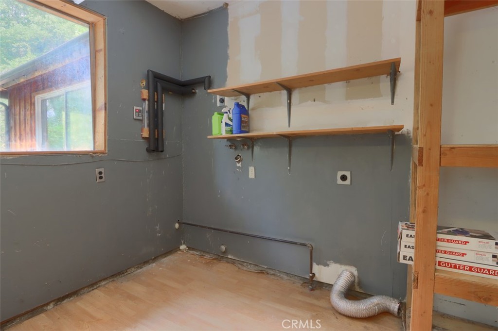 7115 Hites Cove Road Mariposa, CA 95338 - Photo 32 of 48 a bathroom with a sink and a mirror