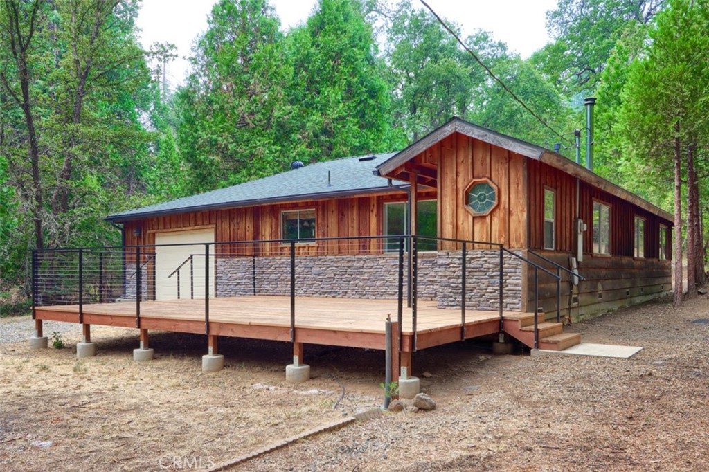 7115 Hites Cove Road Mariposa, CA 95338 - Photo 35 of 48 a view of a house with a yard