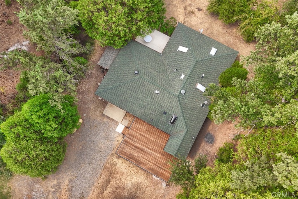 7115 Hites Cove Road Mariposa, CA 95338 - Photo 47 of 48 a view of a house with a yard and potted plants