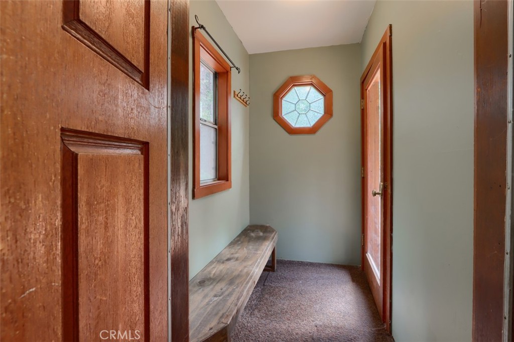 7115 Hites Cove Road Mariposa, CA 95338 - Photo 5 of 48 a view of a hallway with windows