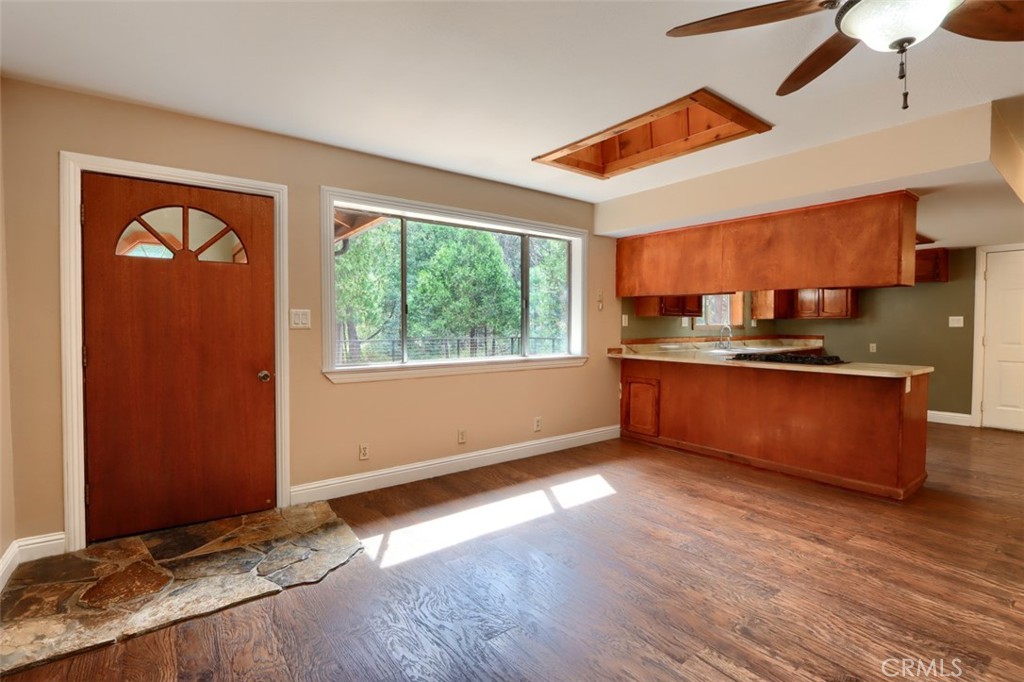7115 Hites Cove Road Mariposa, CA 95338 - Photo 8 of 48 a view of kitchen with wooden floor and electronic appliances