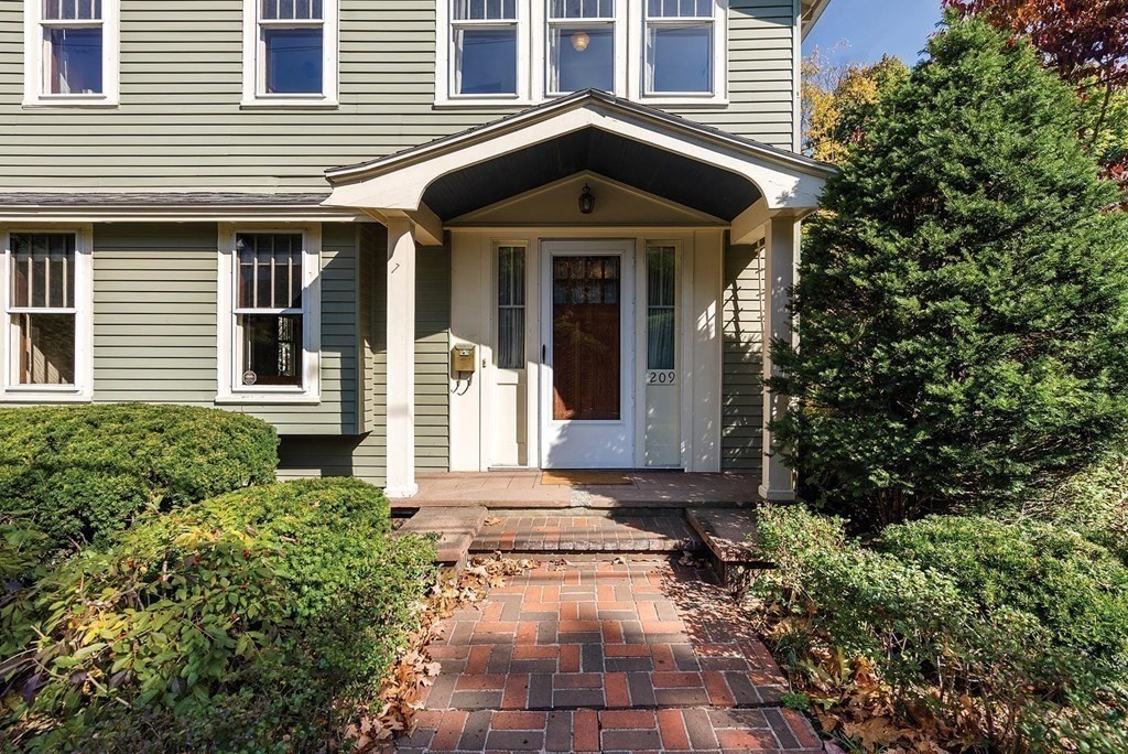 209 Reservoir Road Brookline, MA 02467 - Photo 23 of 24 a front view of a house with a yard