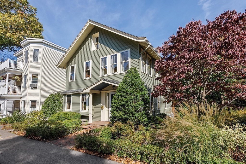 209 Reservoir Road Brookline, MA 02467 - Photo 24 of 24 a front view of a house with a yard and trees