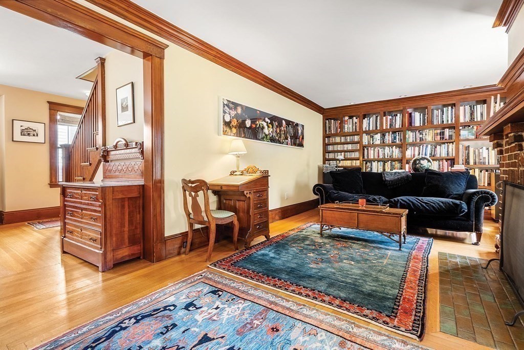 209 Reservoir Road Brookline, MA 02467 - Photo 3 of 24 a living room with furniture and wooden floor