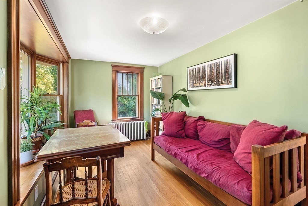 209 Reservoir Road Brookline, MA 02467 - Photo 10 of 24 a living room with furniture and a window
