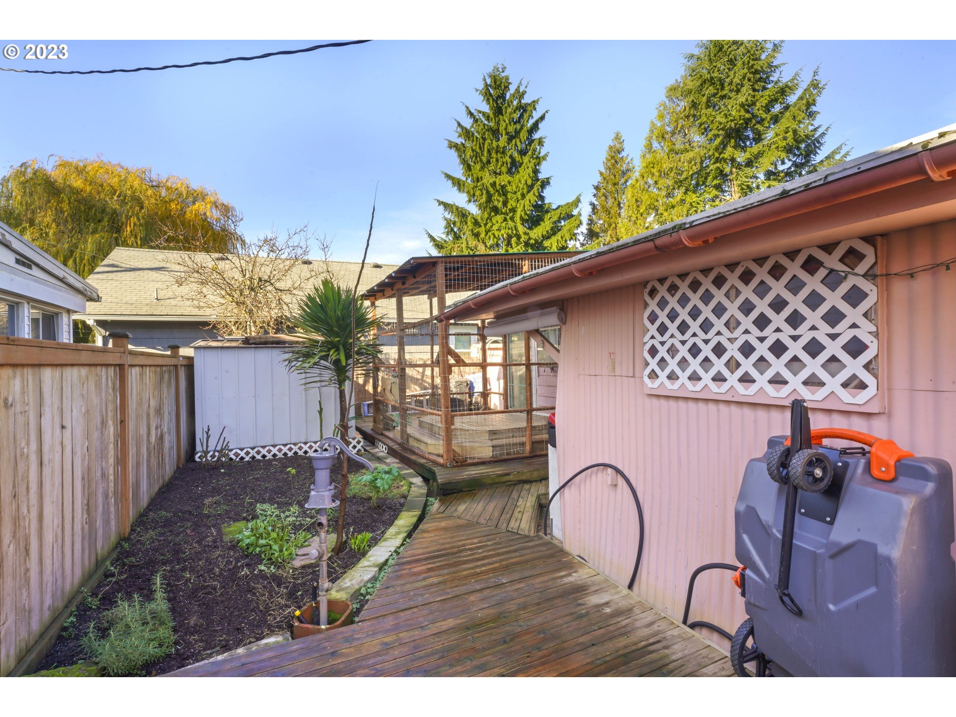 855 D Street Springfield, OR 97477 - Photo 14 of 18 a backyard of a house with table and chairs