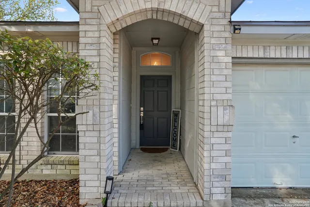 a bathroom with a sink and shower