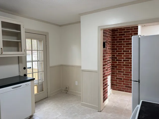 a view of walk in closet with window