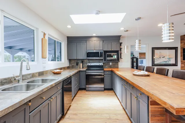 a bedroom with a bed and a table