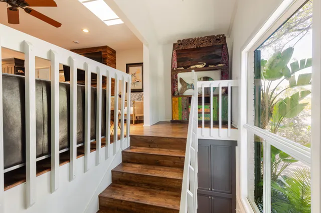 a view of a backyard of the house