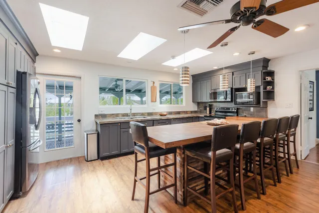 a view of a chairs and table in the patio