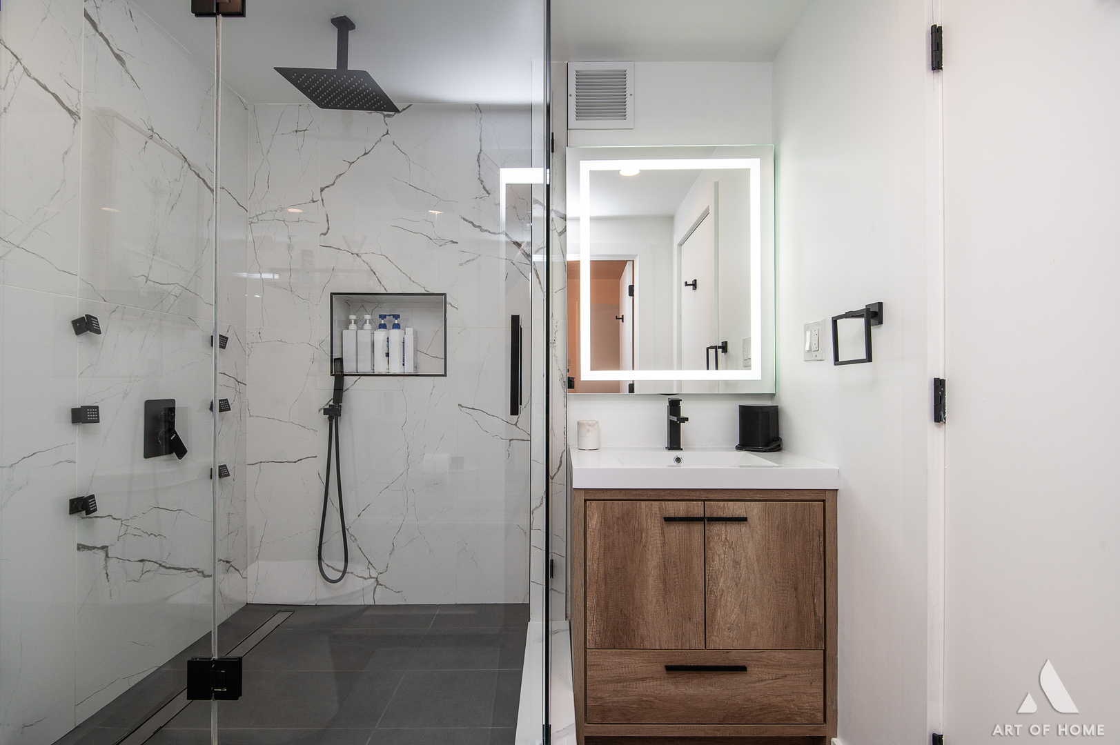 2909 North Sheridan Road, Unit 407 Chicago, IL 60657 - Photo 15 of 20 a bathroom with a sink a toilet and shower