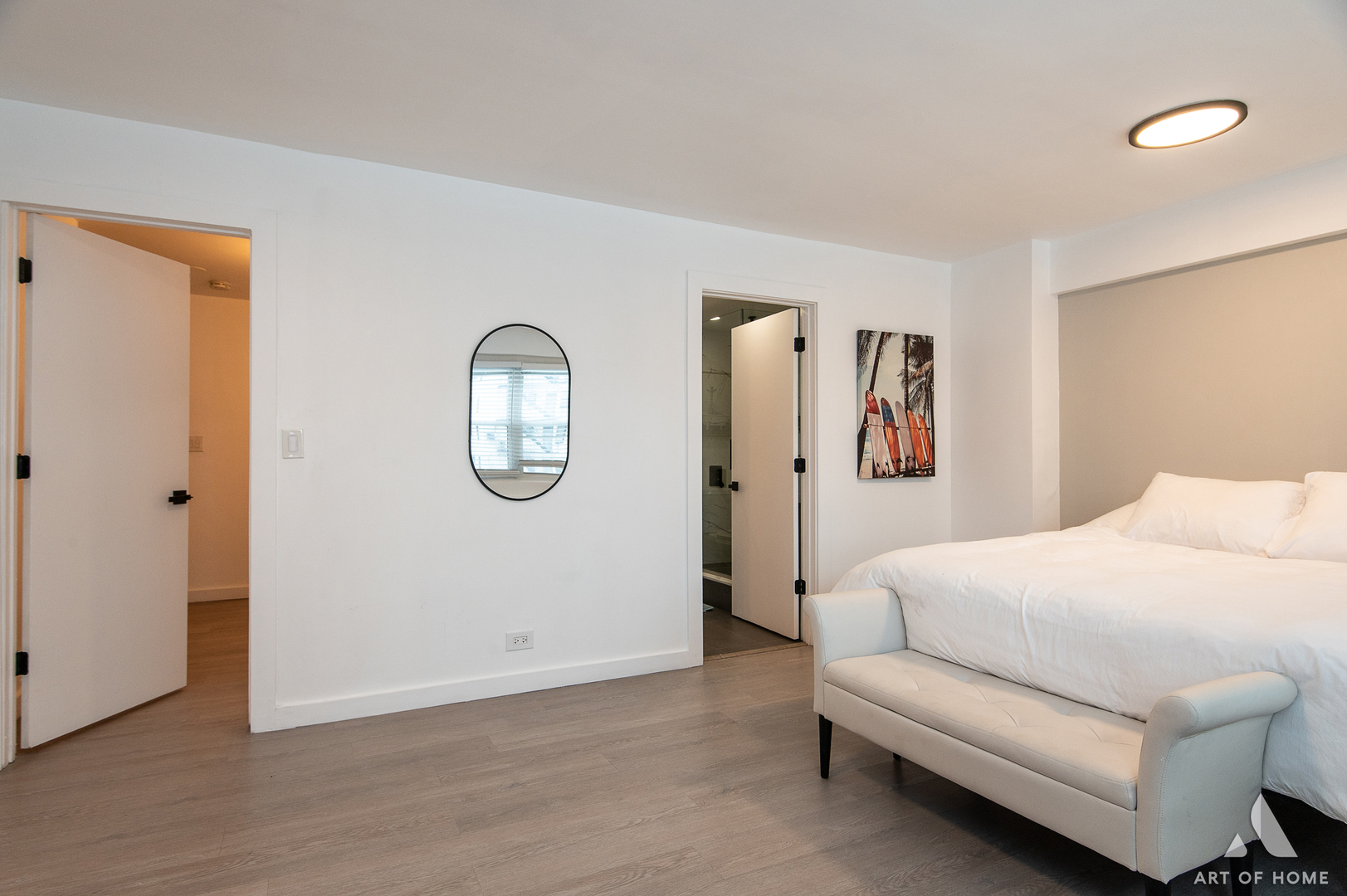 2909 North Sheridan Road, Unit 407 Chicago, IL 60657 - Photo 17 of 20 a spacious bedroom with a bed and a couch