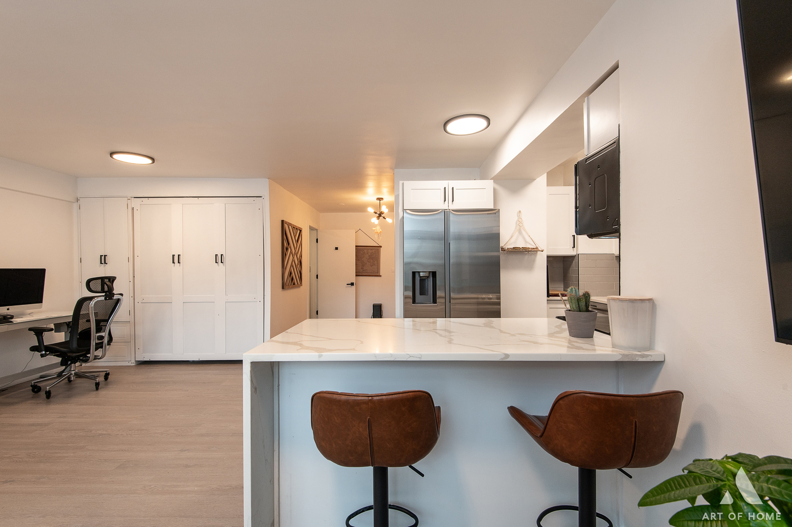 2909 North Sheridan Road, Unit 407 Chicago, IL 60657 - Photo 6 of 20 a view of kitchen with stainless steel appliances granite countertop a sink and a refrigerator