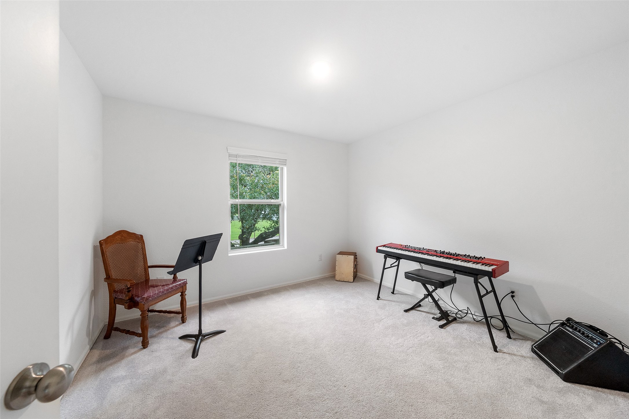 234 Bennett Street Angleton, TX 77515 - Photo 22 of 33 Secondary bedroom currently being used as a music room.
