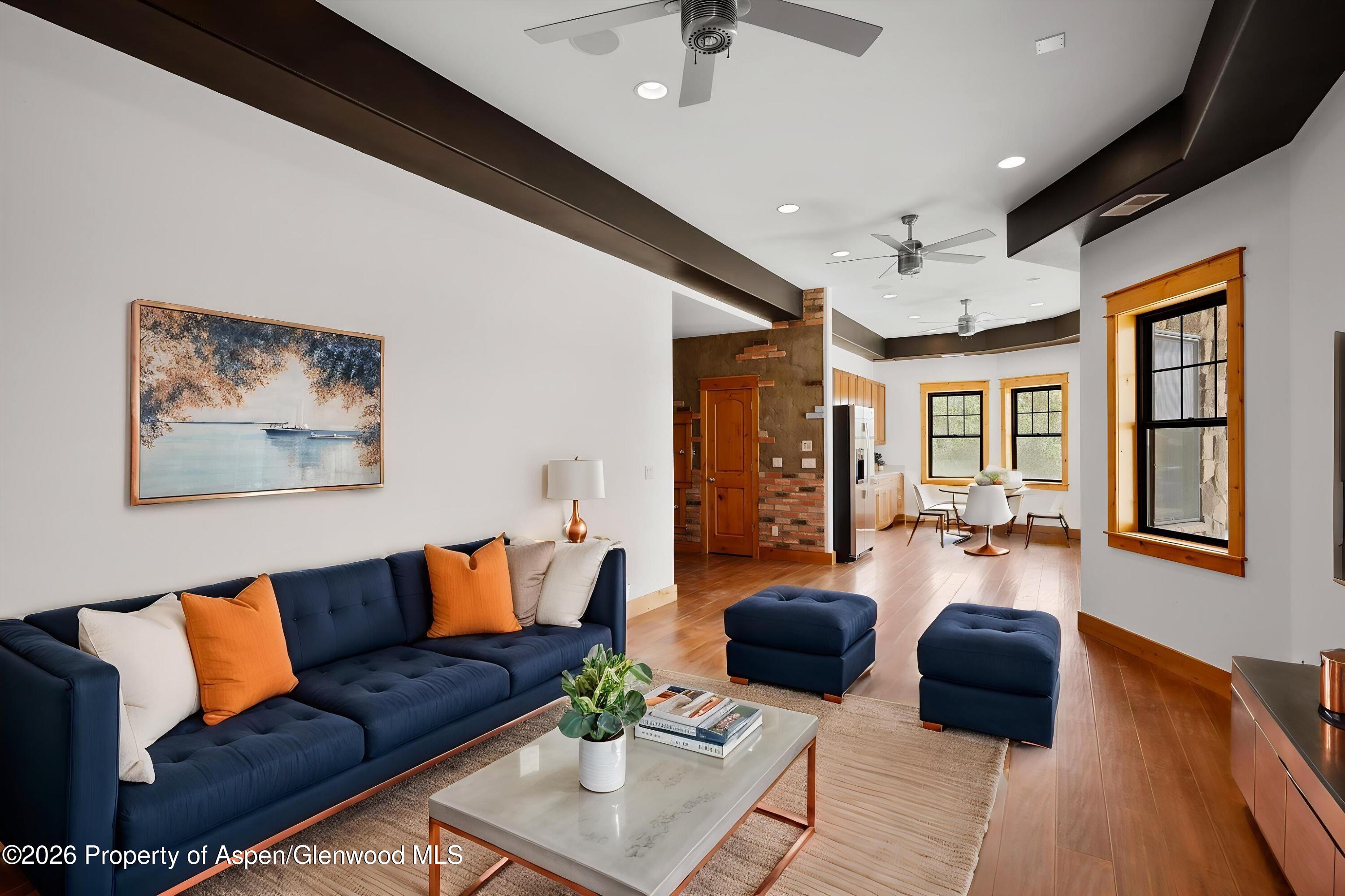 450 Summer Falls Road Silt, CO 81652 - Photo 24 of 50 a living room with furniture and a couch