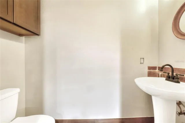 a view of kitchen with furniture and a window